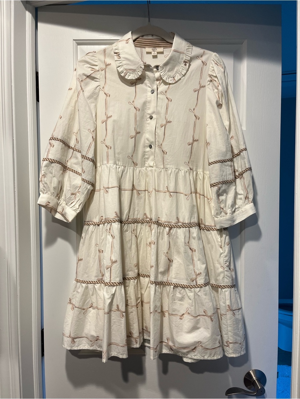 entro Cream Flowy Mini Dress with Bow Print